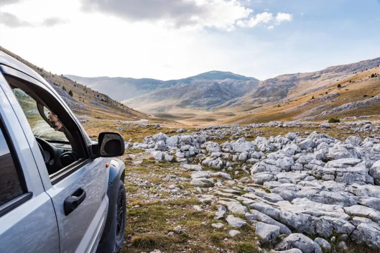 Car in Kyrgyzstan landscape